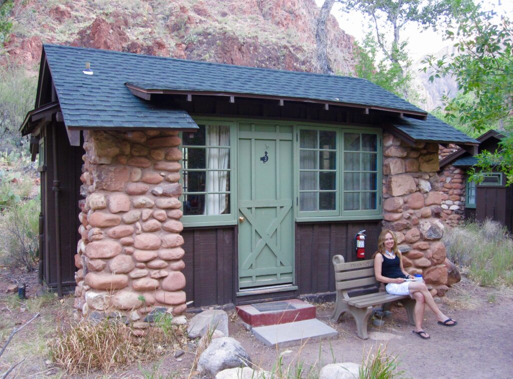 Karen Smith in front of a cabin at Phantom Ranch in Grand Canyon National Park