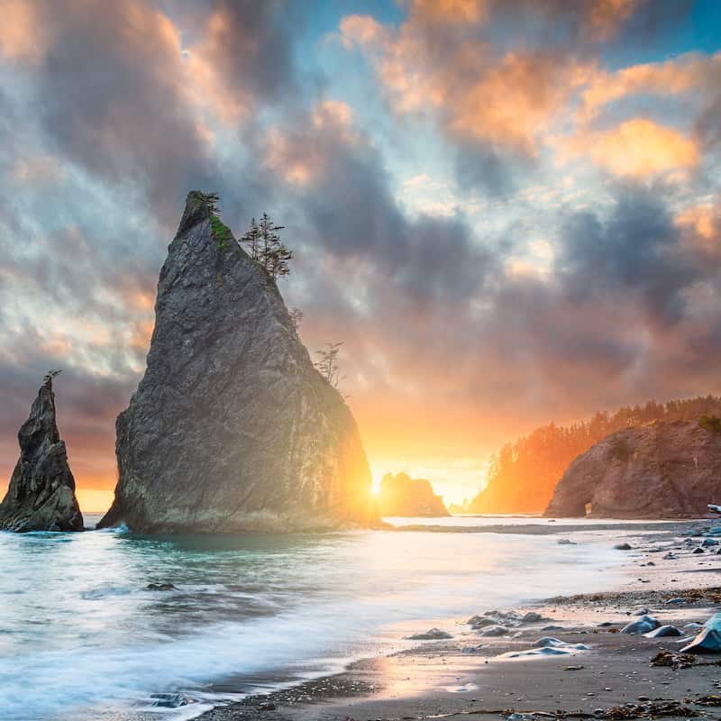 Iconic sea stacks at Rialto Beach in Olympic National Park in Washington, highlighting a spectacular stop on a Washington and Oregon road trip.
