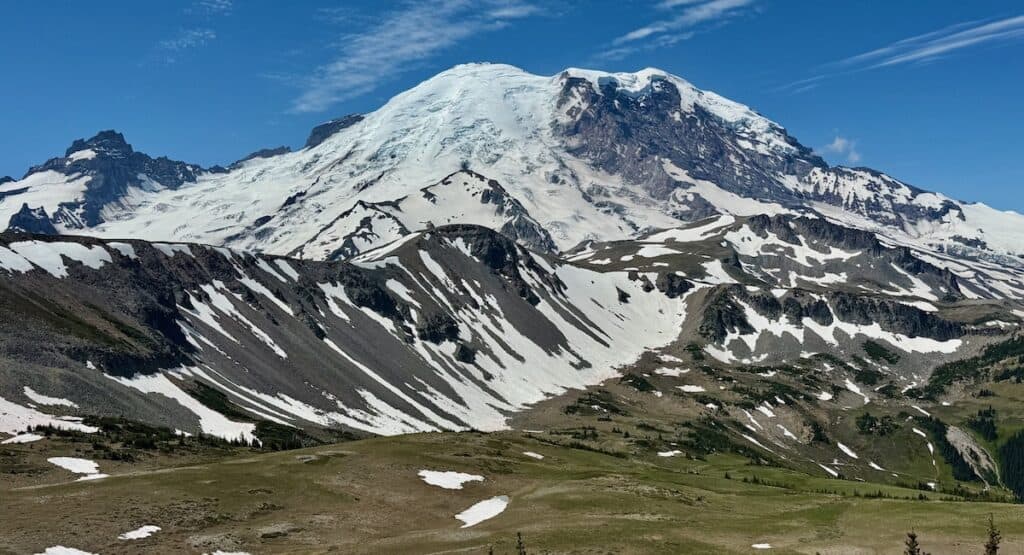 Mount Rainier on a sunny summer day with a view of its glaciers