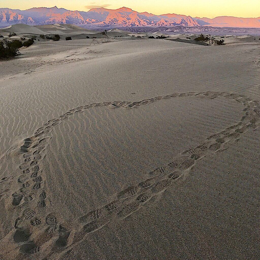 heart-shaped footprints in sands dunes