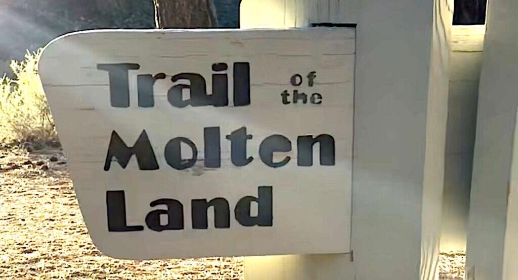 trail sign that indicates this is the trail of the molten land in newberry national volcanic monument in oregon